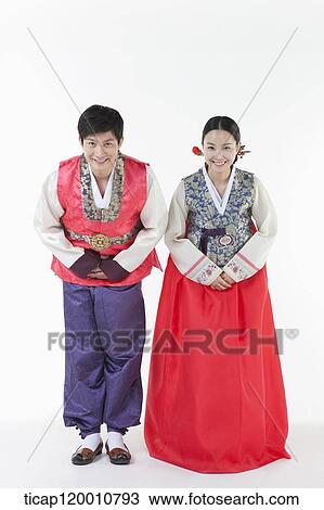 a couple bowing wearing Hanbok View Large Photo Image Stock Image - a couple bowing wearing Hanbok . Fotosearch