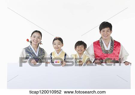 a family in Hanbok holding an empty whiteboard View Large Photo Image Stock Image - a family in Hanbok holding an empty whiteboard. Fotosearch