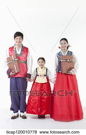 a family walking together in Hanbok View Large Photo Image Stock Photo - a family walking together in Hanbok. Fotosearch
