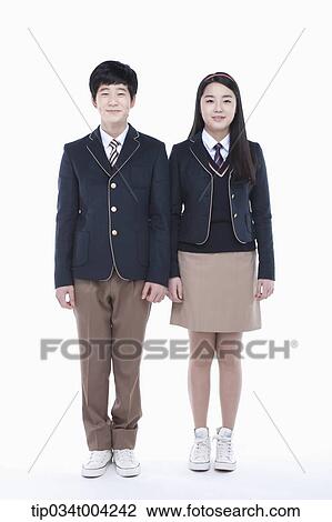 a female and a male student with school uniform View Large Photo Image Stock Image - a female and a male student with school uniform . Fotosearch