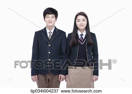 a female and a male student with school uniform View Large Photo Image Stock Photo - a female and a male student with school uniform . Fotosearch