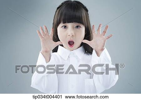 a female kid being surprised View Large Photo Image Stock Image - a female kid being surprised . Fotosearch