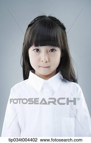 a female kid with white shirts View Large Photo Image Stock Image - a female kid with white shirts . Fotosearch