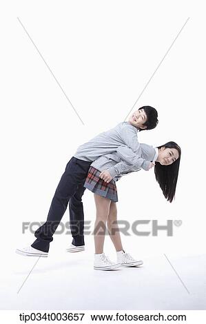 a female student carrying male student on her back View Large Photo Image Stock Photo - a female student carrying male student on her back. Fotosearch