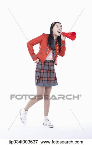 a female student speaking through a red megaphone View Large Photo Image Stock Photo - a female student speaking through a red megaphone. Fotosearch