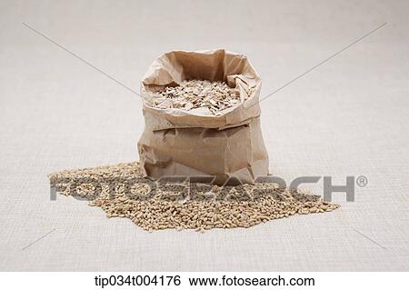 a floor full of seeds and a paper bag with seeds View Large Photo Image Stock Photograph - a floor full of seeds and a paper bag with seeds . Fotosearch