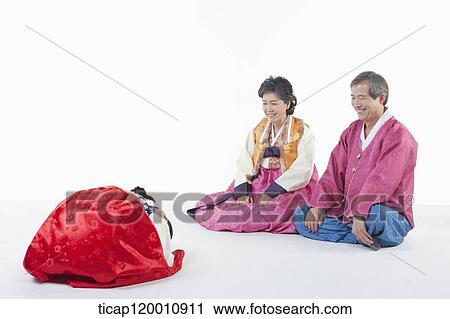 a girl bowing to grandparents wearing Hanbok View Large Photo Image Stock Image - a girl bowing to grandparents wearing Hanbok. Fotosearch