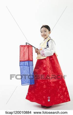 a girl in Hanbok holding a paper lamp View Large Photo Image Picture - a girl in Hanbok holding a paper lamp . Fotosearch