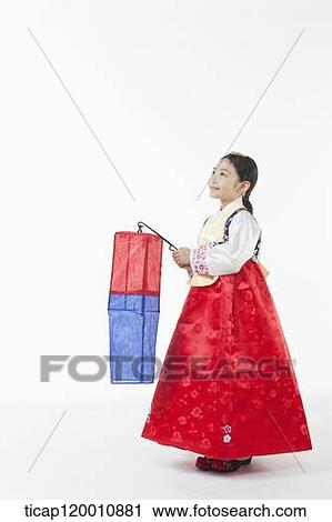 a girl in Hanbok holding a paper lamp View Large Photo Image Stock Image - a girl in Hanbok holding a paper lamp . Fotosearch
