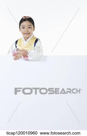 a girl in Hanbok holding an empty whiteboard View Large Photo Image Stock Image - a girl in Hanbok holding an empty whiteboard. Fotosearch