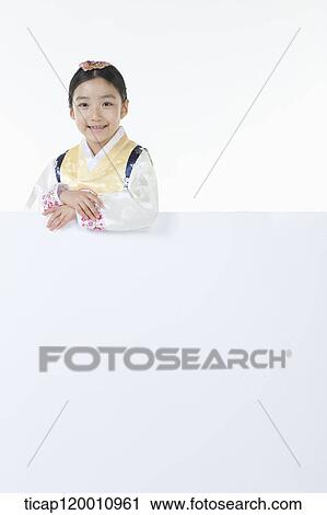 a girl in Hanbok holding an empty whiteboard View Large Photo Image Stock Image - a girl in Hanbok holding an empty whiteboard. Fotosearch