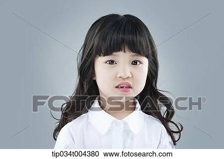 Stock Image - a girl looking at you. Fotosearch