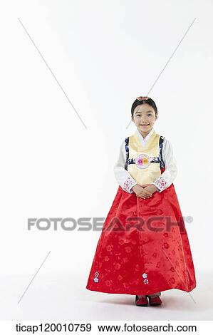 a girl wearing a Hanbok dress View Large Photo Image Stock Photo - a girl wearing a Hanbok dress. Fotosearch