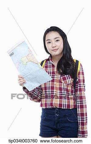 Stock Image - a lady holding a map . Fotosearch
