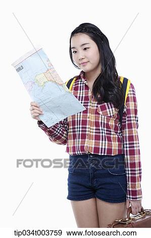 a lady looking at a map View Large Photo Image Stock Photo - a lady looking at a map . Fotosearch