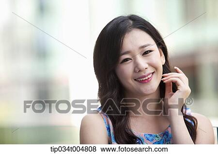 a lady smiling View Large Photo Image Stock Photo - a lady smiling. Fotosearch