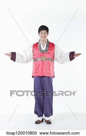 a man wearing a Hanbok spreading arms View Large Photo Image Stock Photography - a man wearing a Hanbok spreading arms . Fotosearch