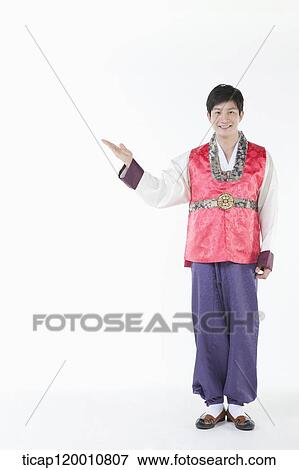 a man wearing a Hanbok spreading one arm View Large Photo Image Stock Photo - a man wearing a Hanbok spreading one arm. Fotosearch