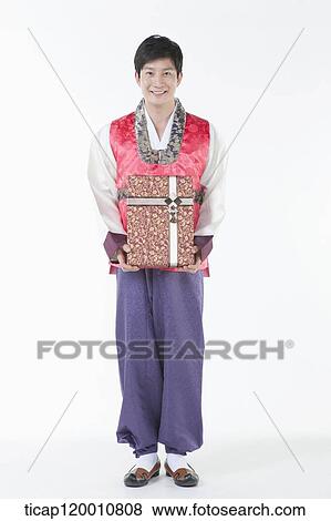 a man wearing a Hanbok standing straight View Large Photo Image Stock Photo - a man wearing a Hanbok standing straight. Fotosearch