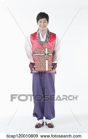 a man wearing a Hanbok standing straight View Large Photo Image Stock Photo - a man wearing a Hanbok standing straight. Fotosearch