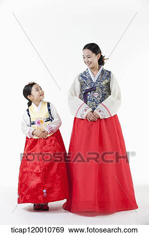 a mother and a daughter looking at each other wearing Hanbok dress View Large Photo Image Stock Photo - a mother and a daughter looking at each other wearing Hanbok dress. Fotosearch