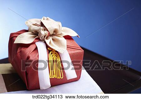 a package in Korean traditional wrap on traditional table View Large Photo Image Stock Image - a package in Korean traditional wrap on traditional table. Fotosearch