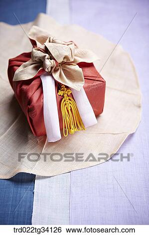 Stock Photograph - a package in Korean traditional wrap on hanji . Fotosearch