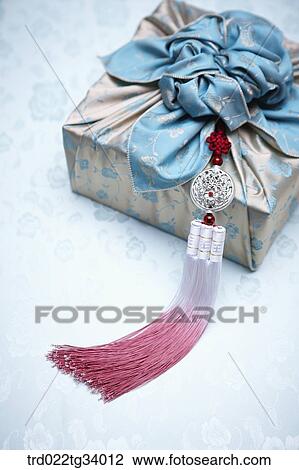 Stock Image - a package wrapped in a traditional wrap . Fotosearch