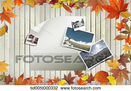 a paper and pictures on a wooden plank surrounded by autumn leaves View Large Photo Image Stock Image - a paper and pictures on a wooden plank surrounded by autumn leaves. Fotosearch