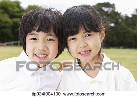 Stock Image - a son and a daughter together. Fotosearch