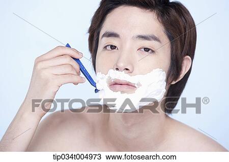 a topless man shaving View Large Photo Image Stock Image - a topless man shaving. Fotosearch
