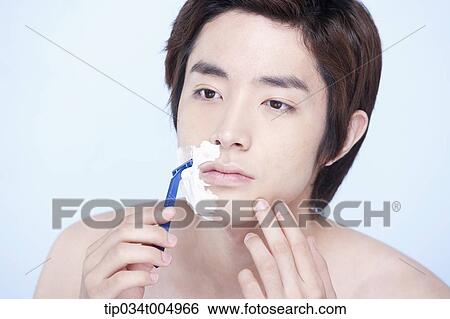 a topless man starting to shave View Large Photo Image Stock Photograph - a topless man starting to shave. Fotosearch