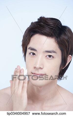 Stock Photo - a topless man with shaving cream on his fingers . Fotosearch