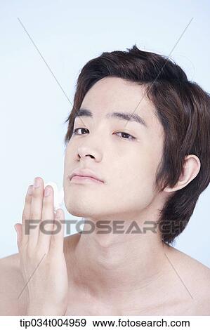 Stock Photo - a topless man with shaving cream on his fingers . Fotosearch