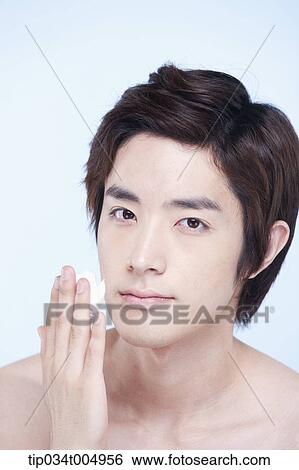 Stock Photograph - a topless man with shaving cream on his fingers . Fotosearch