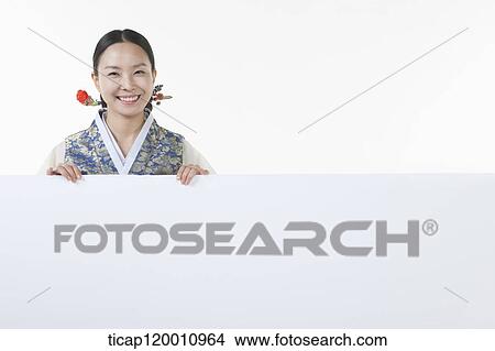 a woman in Hanbok holding an empty whiteboard View Large Photo Image Picture - a woman in Hanbok holding an empty whiteboard. Fotosearch