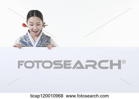 a woman in Hanbok holding an empty whiteboard View Large Photo Image Stock Photo - a woman in Hanbok holding an empty whiteboard. Fotosearch