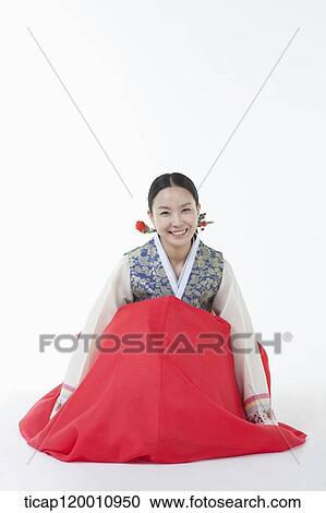 a woman sitting on the floor in Hanbok View Large Photo Image Stock Image - a woman sitting on the floor in Hanbok . Fotosearch
