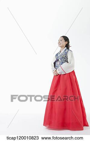 a woman wearing a Hanbok facing side ways View Large Photo Image Stock Image - a woman wearing a Hanbok facing side ways . Fotosearch