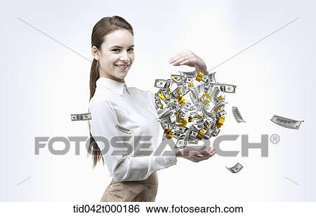 a woman with money circulating between her hands View Large Photo Image Stock Photograph - a woman with money circulating between her hands . Fotosearch