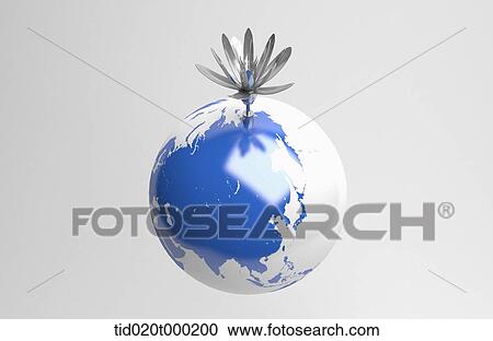 Stock Image - an artificial silver flower on a globe. Fotosearch
