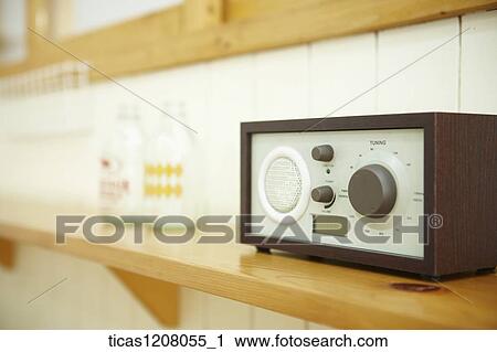 bottles and radio on the shelf View Large Photo Image Stock Image - bottles and radio on the shelf. Fotosearch