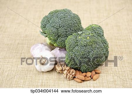 broccoli, garlic and nuts View Large Photo Image Picture - broccoli, garlic and nuts . Fotosearch