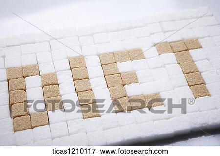 brown sugar cubes forming a word diet with white sugar cubes filling the background View Large Photo Image Stock Photo - brown sugar cubes forming a word diet with white sugar cubes filling the background . Fotosearch