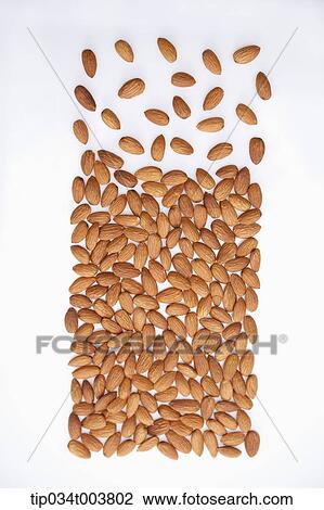 Stock Image - bunch of almonds forming a shape of rectangle. Fotosearch