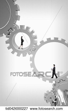 businessman and woman walking in connected gears View Large Photo Image Stock Photo - businessman and woman walking in connected gears. Fotosearch
