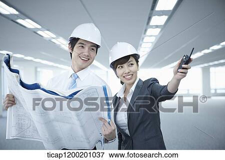 close up shot of architect executives in an empty room View Large Photo Image Stock Photo - close up shot of architect executives in an empty room. Fotosearch