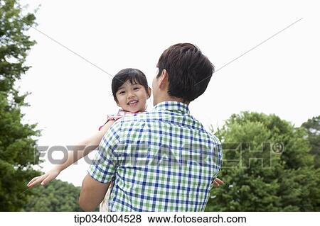 dad hugging a daughter View Large Photo Image Stock Photo - dad hugging a daughter. Fotosearch