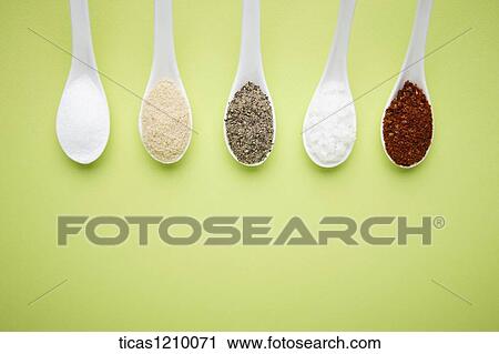 different colours of sugar on Chinese spoons in a line View Large Photo Image Stock Image - different colours of sugar on Chinese spoons in a line. Fotosearch