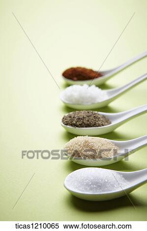 different colours of sugar on Chinese spoons in a line View Large Photo Image Stock Photography - different colours of sugar on Chinese spoons in a line. Fotosearch